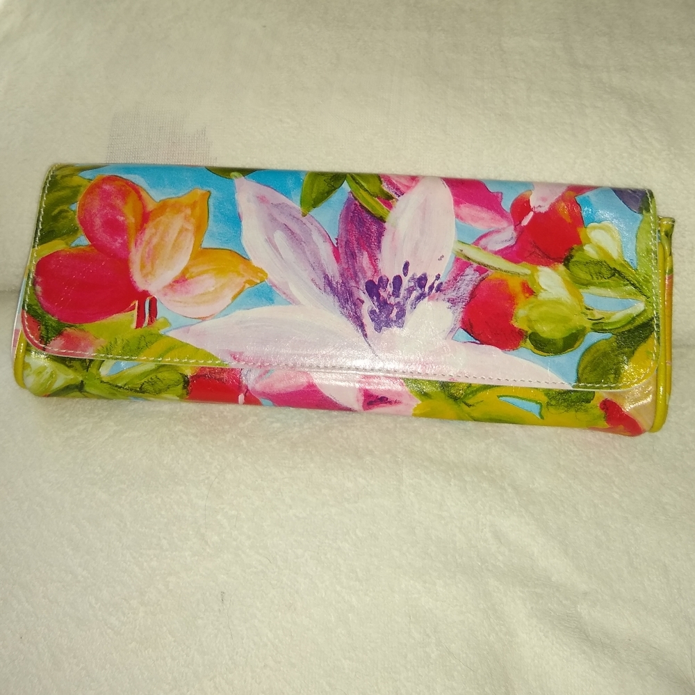 Maurizio Taiuti floral leather clutch.